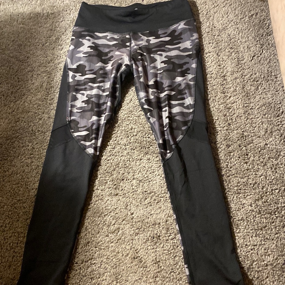 Camouflage and black workout leggings